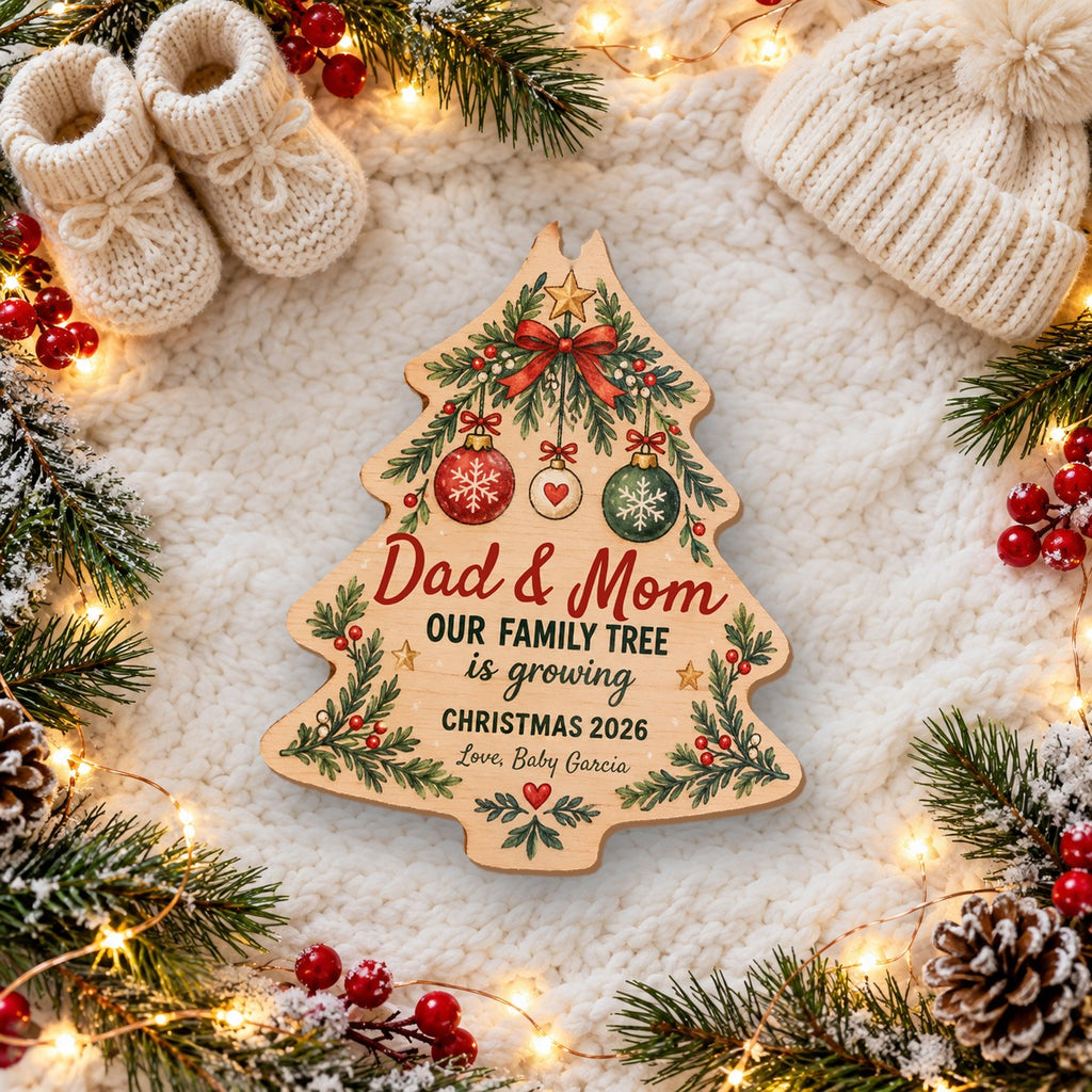 Personalized Our Family Tree Is Growing Wooden ornament flat lay with baby booties