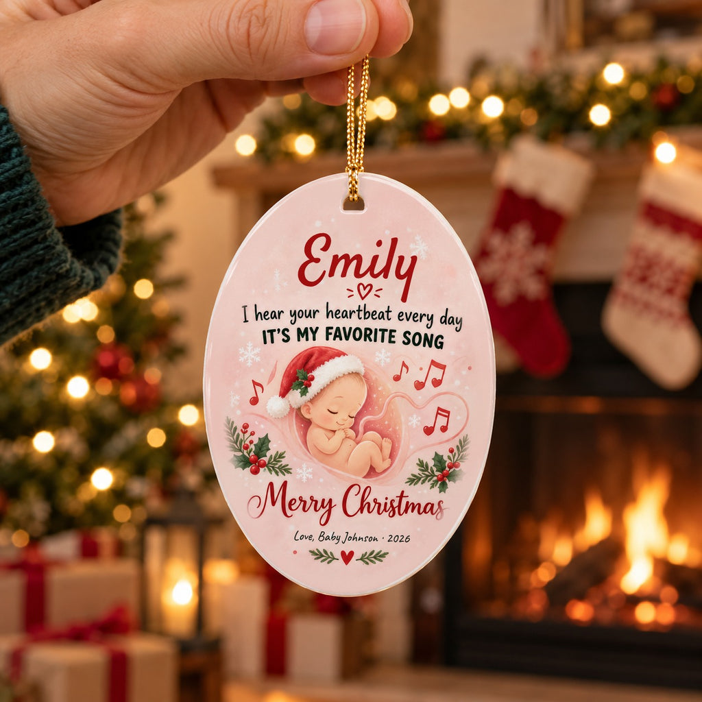 Personalized Mommy, Your Heartbeat Is My Favorite Song ornament held up in front of a fireplace