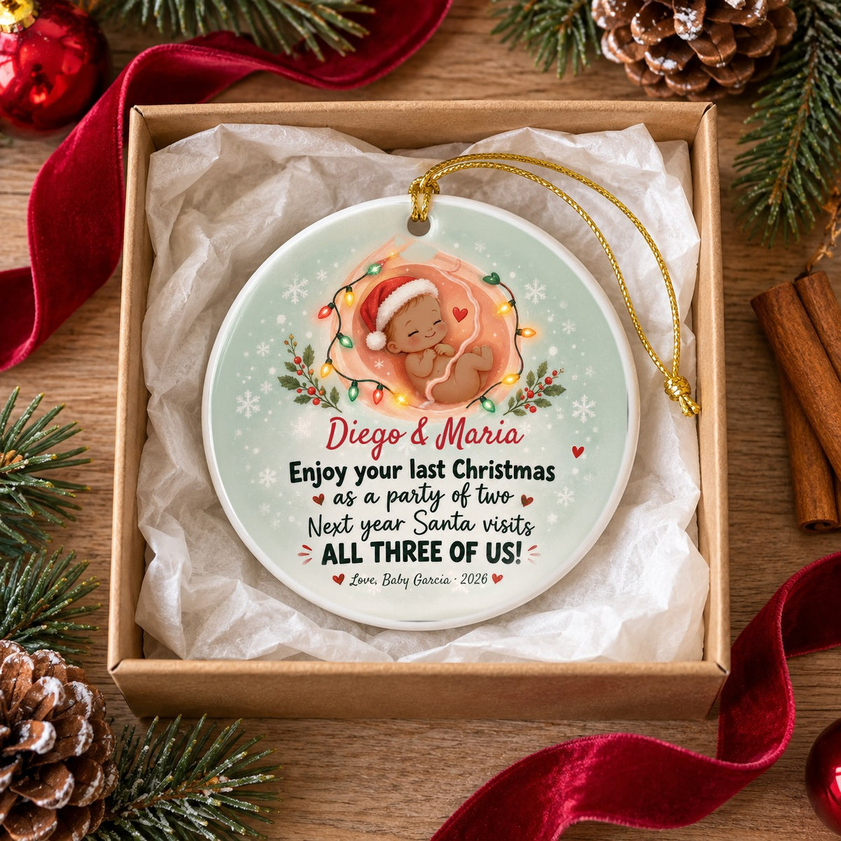 Party of Two ceramic Christmas ornament personalized Diego & Maria, Love Baby Garcia 2026, in a kraft gift box
