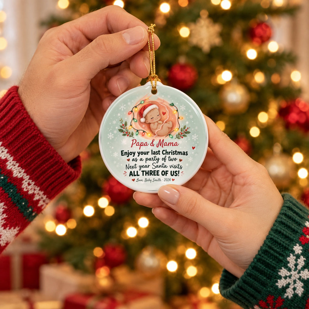 Couple holding the Party of Two Christmas ornament personalized Papa & Mama, Love Baby Smith 2026